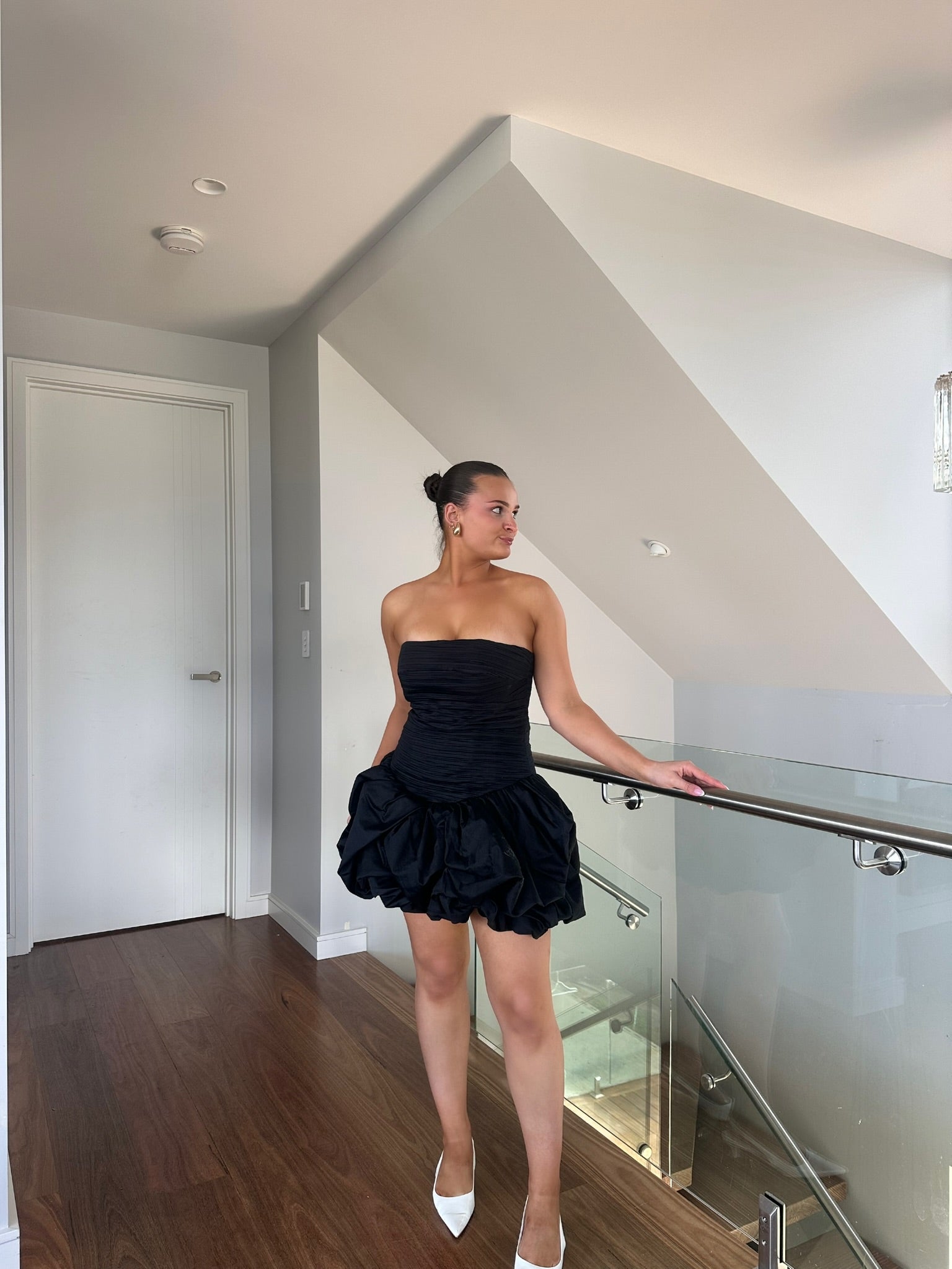 AJE Bubble Hem Mini in Black HONEY HIRE BOUTIQUE AJE Bubble Hem Mini in Black HONEY HIRE BOUTIQUE
